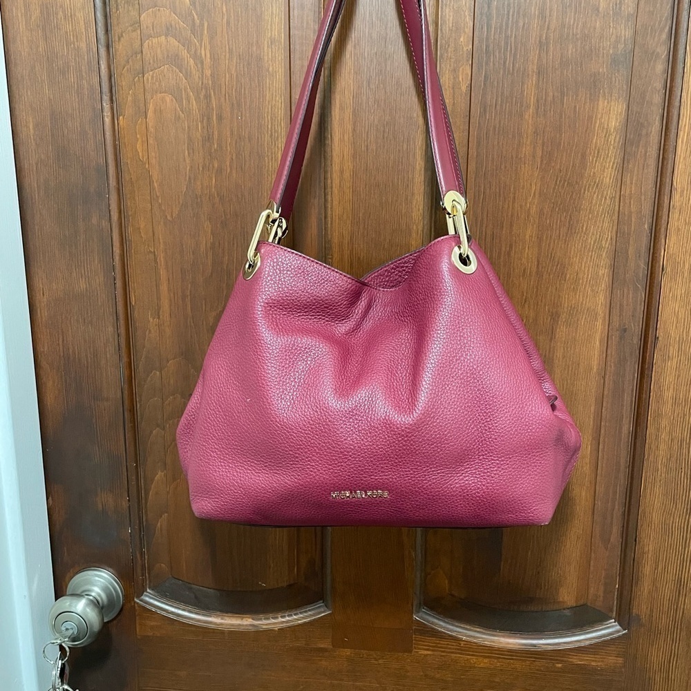 Michael Kors  Burgundy pebbled leather shoulder bag with three compartment